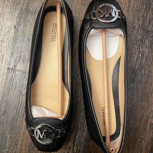 Michael Kors Black Leather moccasins 8.5, New with Tag and box.